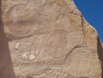 So-called â€œshield motifsâ€ at Castle Gardens, Wyoming. Probably carved by ancestors of the Navajo and Apache between 1000 and 1250 AD.